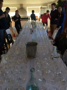 The table is set for 20 guests, each tasting 15 wines. That's a lot of glassware!