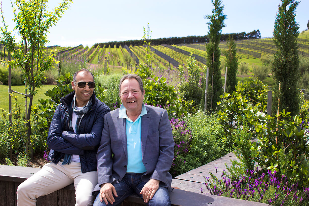 JJ and Puneet enjoy the sun and the vines on the Sensational Waiheke Island