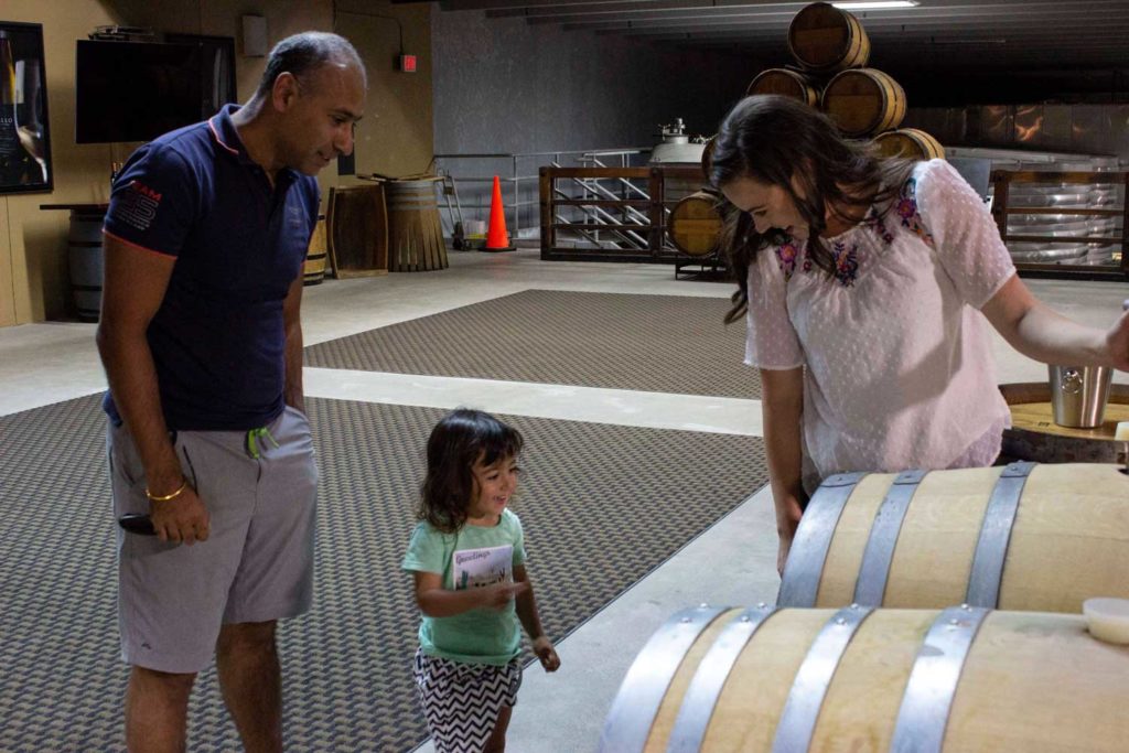 Puneet Dhall and son in Frei Ranch barrel cellar